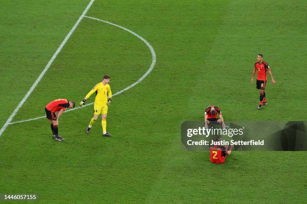 Toby Alderweireld of Belgium looks dejected with teammates after their sides' elimination from the tournament in the FIFA World Cup Qatar 2022 Group...