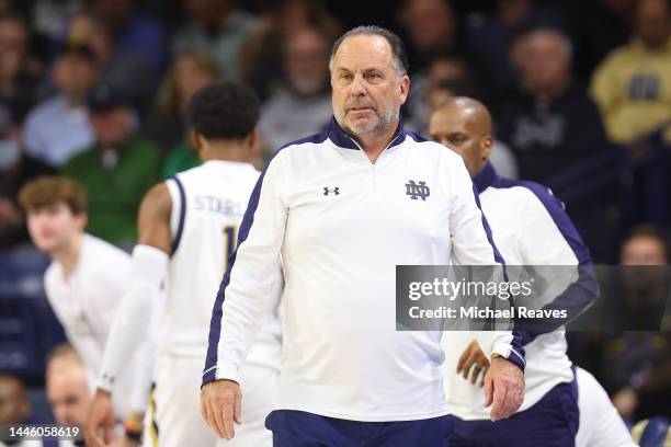 Head coach Mike Brey of the Notre Dame Fighting Irish looks on against the Michigan State Spartans during the first half at the Purcell Pavilion at...