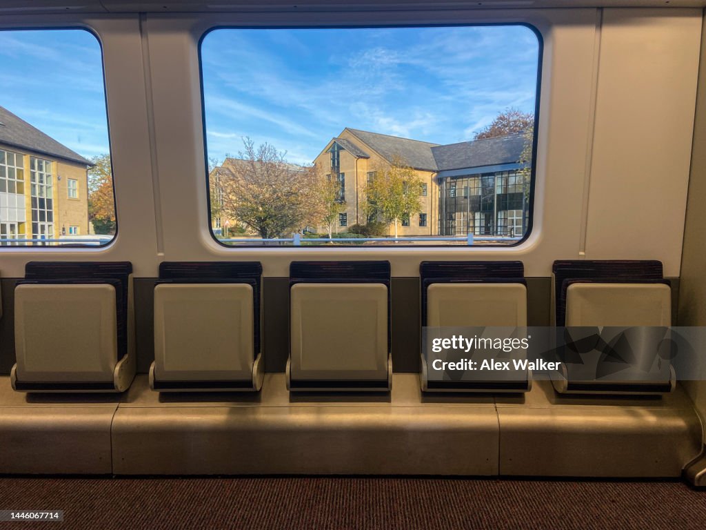 Modern Passenger Train Interior With Folding Seats High-Res Stock Photo ...