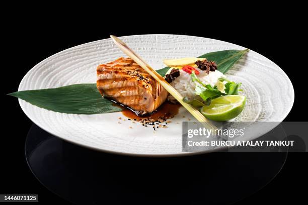asian salmon steak with basmati rice - salmon steak stock pictures, royalty-free photos & images