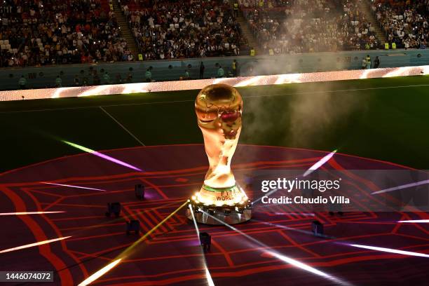 Pyrotechnics surround a giant FIFA World Cup trophy prior to the FIFA World Cup Qatar 2022 Group E match between Costa Rica and Germany at Al Bayt...