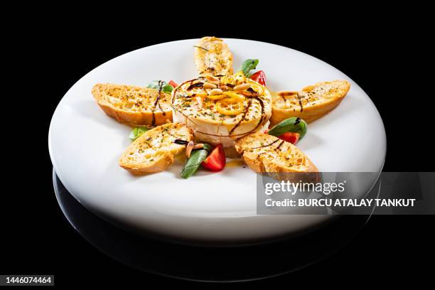 grilled camembert cheese - baked brie stock pictures, royalty-free photos & images