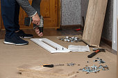 Assembling new furniture with your own hands according to the instructions, improving living conditions