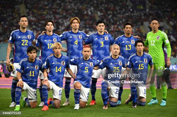 Japan players line up for the team photos prior to the FIFA World Cup Qatar 2022 Group E match between Japan and Spain at Khalifa International...