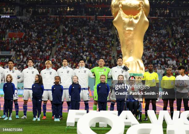 Japan players line up for the national anthem prior to the FIFA World Cup Qatar 2022 Group E match between Japan and Spain at Khalifa International...