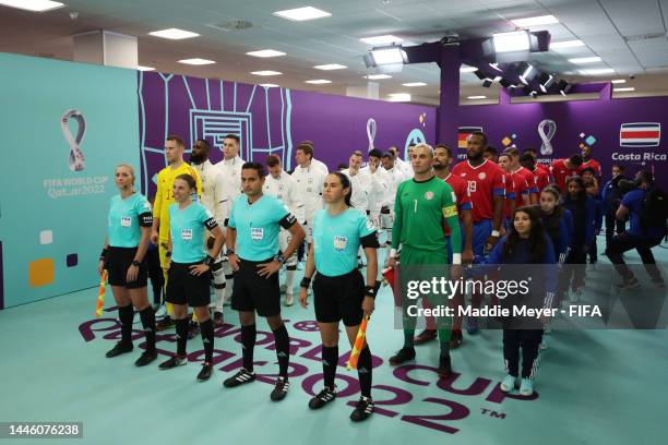 Referees Neuza Ines Back, Stephanie Frappart and Karen Diaz Medina prepare to enter the pitch prior to the FIFA World Cup Qatar 2022 Group E match...