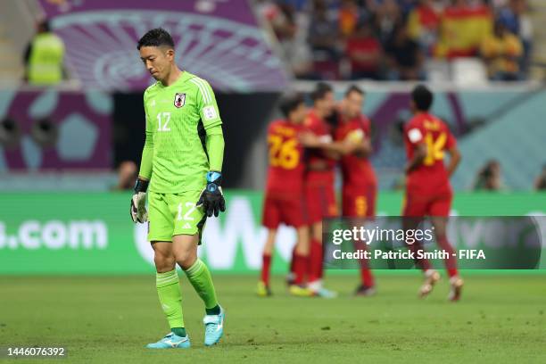 Shuichi Gonda of Japan shows dejection after Spain's firs goal during the FIFA World Cup Qatar 2022 Group E match between Japan and Spain at Khalifa...