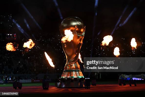 Exploding Trophy Pyrotechnics explode around a giant World Cup trophy prior the FIFA ...