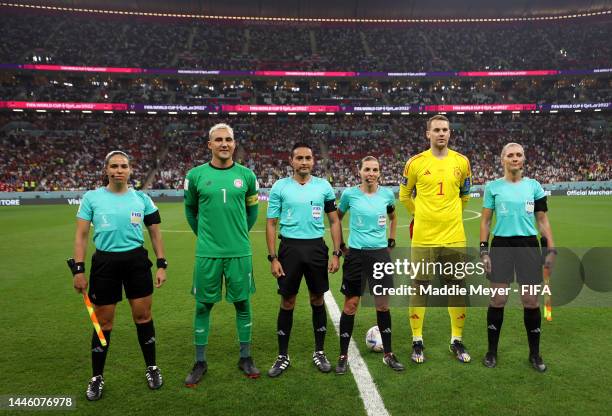 Keylor Navas of Costa Rica and Manuel Neuer of Germany pose for a photo with match officials prior to the FIFA World Cup Qatar 2022 Group E match...