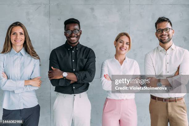 successful business team. - four people office stock pictures, royalty-free photos & images