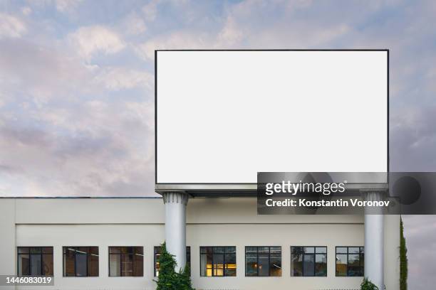outdoor large electronic billboard on the building mockup ready for your content - billboard mockup stock pictures, royalty-free photos & images