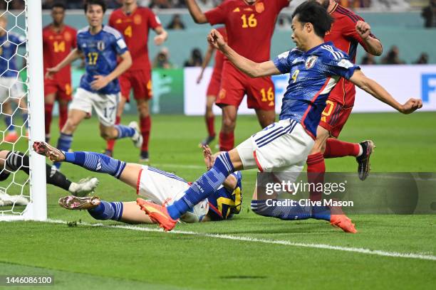 Kaoru Mitoma of Japan crosses the ball on the goal line resulting in the second goal scored by Ao Tanaka during the FIFA World Cup Qatar 2022 Group E...