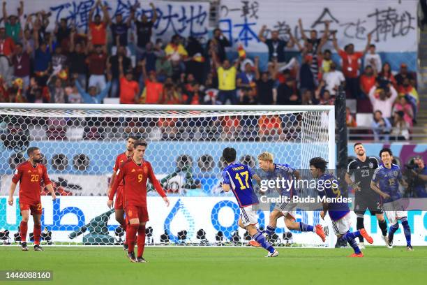 Ritsu Doan of Japan celebrates after scoring the team's first goal during the FIFA World Cup Qatar 2022 Group E match between Japan and Spain at...