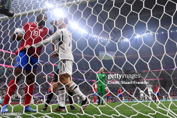 Kendall Waston of Costa Rica clashes with Kai Havertz of Germany after Germany's second goal during the FIFA World Cup Qatar 2022 Group E match...