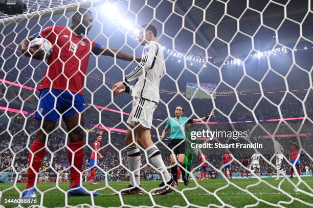 Kendall Waston of Costa Rica clashes with Kai Havertz of Germany after Germany's second goal during the FIFA World Cup Qatar 2022 Group E match...