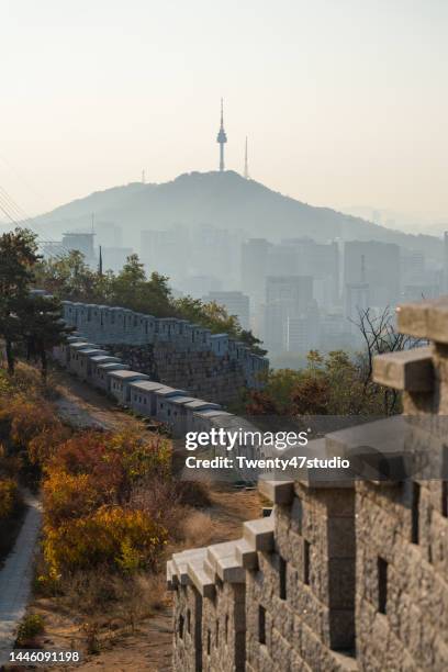 n seoul tower view from inwangsan mountain in the morning - seoul aerial stock pictures, royalty-free photos & images