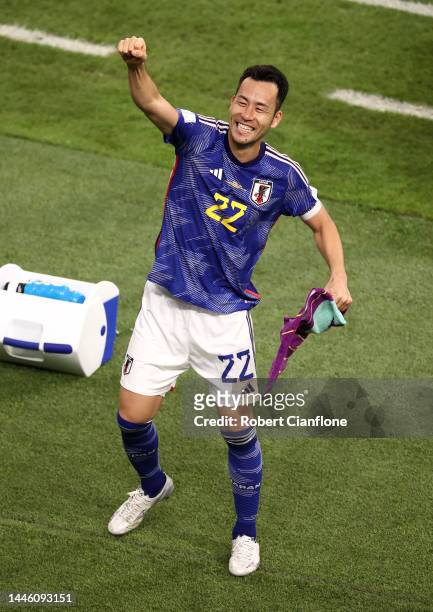 Maya Yoshida of Japan celebrates their 2-1 victory and qualification to the knock out stage after the FIFA World Cup Qatar 2022 Group E match between...