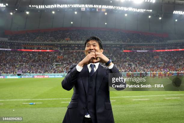 Hajime Moriyasu, Head Coach of Japan, celebrates their 2-1 victory and qualification for the knockout stage after the FIFA World Cup Qatar 2022 Group...