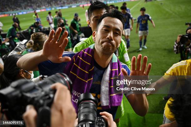 Maya Yoshida of Japan applauds fans after their 2-1 victory and qualification for the knockout stage after the FIFA World Cup Qatar 2022 Group E...