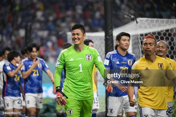 Eiji Kawashima and Japan players celebrates their 2-1 victory and qualification for the knockout stage after the FIFA World Cup Qatar 2022 Group E...