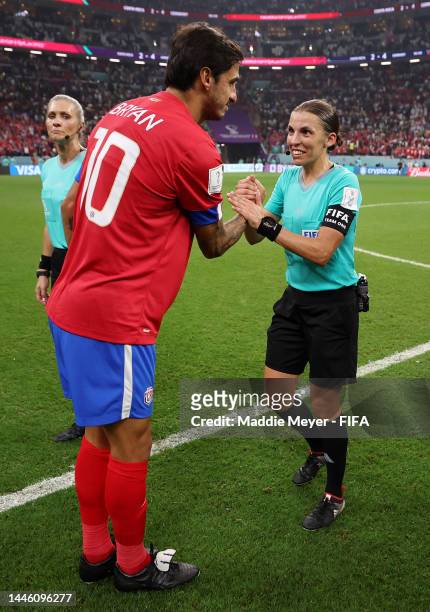 Referee Stephanie Frappart shakes hands with Bryan Ruiz of Costa Rica after the FIFA World Cup Qatar 2022 Group E match between Costa Rica and...