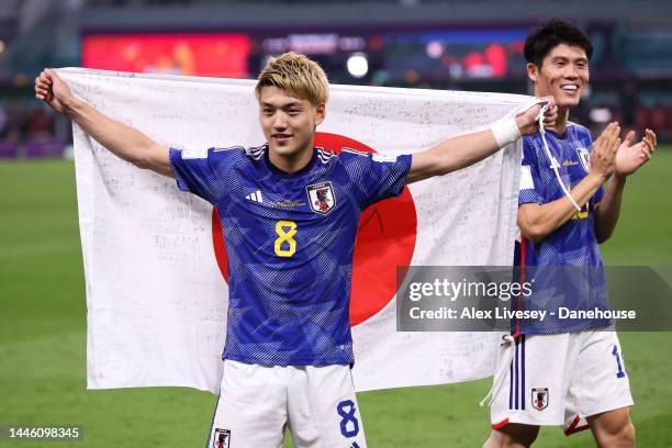 Ritsu Doan of Japan celebrates after the FIFA World Cup Qatar 2022 Group E match between Japan and Spain at Khalifa International Stadium on December...