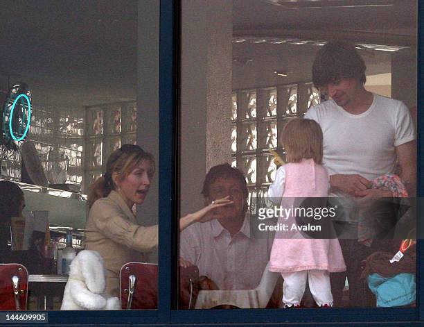 Sir Paul and Heather McCartney with baby Beatrice Milly go out to a noodle bar by the seaside. After lunch Heather spoke of her terror of her baby...