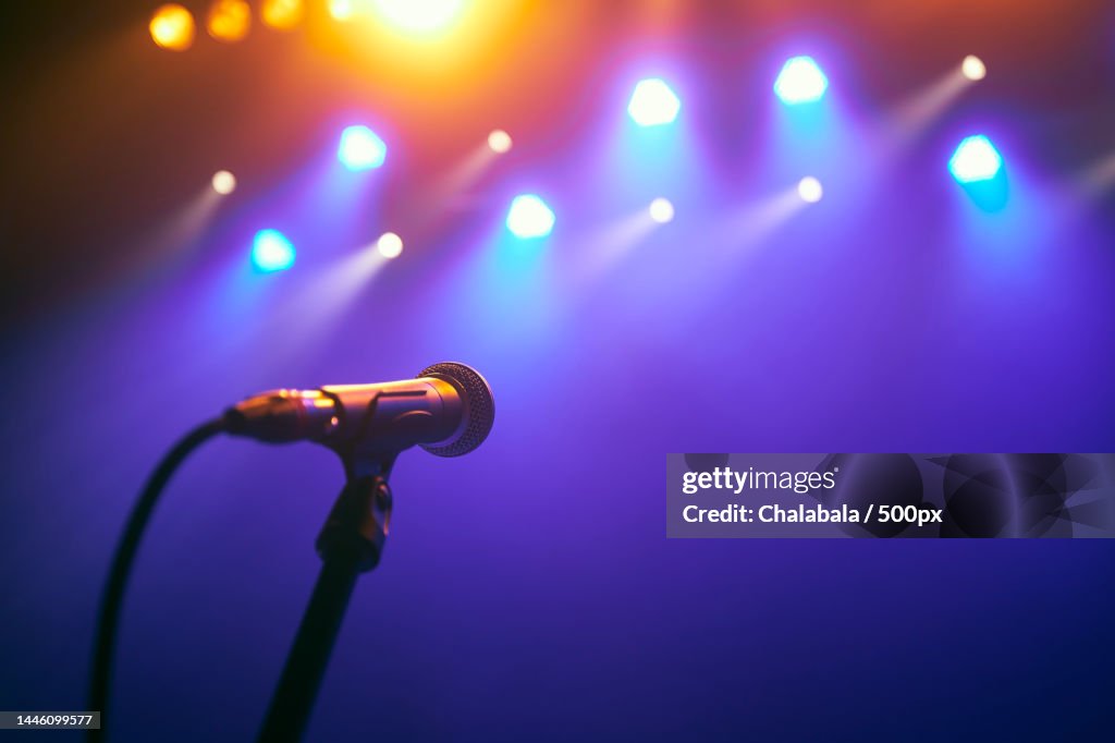 Microphone on stage against colorful spotlights,Czech Republic