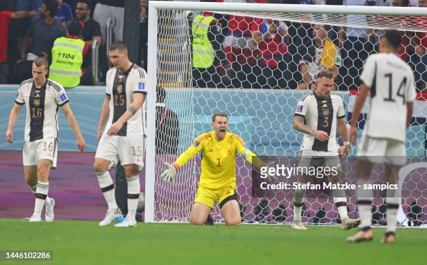 Manuel Neuer of Germany disappointed after goal for Costa Rica with Lukas Klostermann of Germany Niklas Suele of Germany David Raum of Germany during...