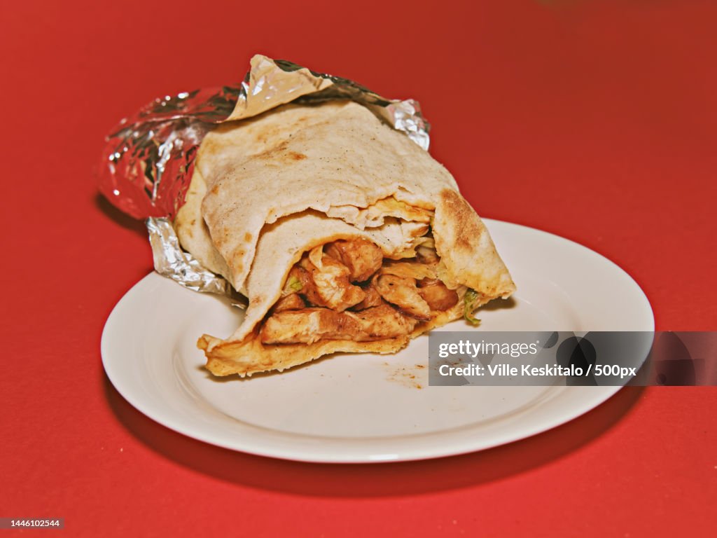 Close-up of food in plate on red background,Oulu,Finland