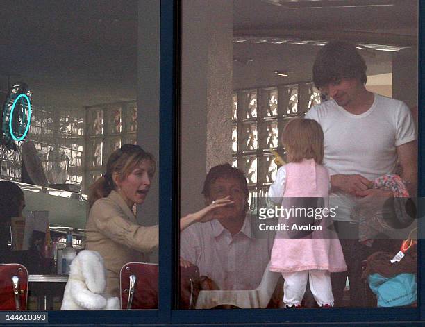 Sir Paul and Heather McCartney with baby Beatrice Milly go out to a noodle bar by the seaside. After lunch Heather spoke of her terror of her baby...