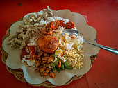 Mixed rice. A popular Indonesian specialty rice meal with various side dishes served with rice and others as optional additions.