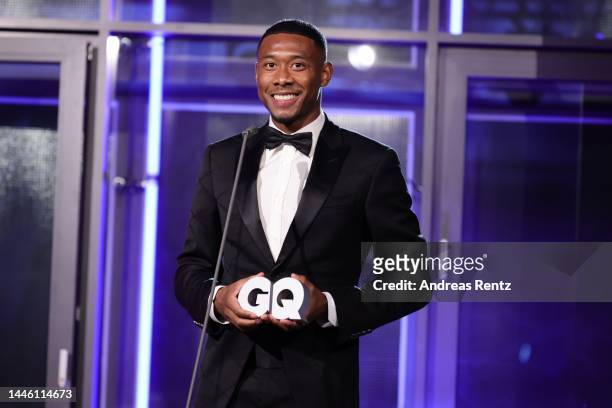 David Alaba speaks on stage after being awarded with the „Sportsman of the Year“ award at the "GQ Men of the Year" Awards 2022 at Kant-Garagen on...