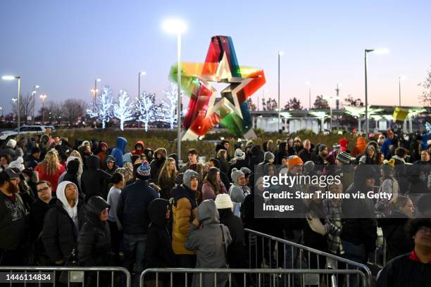 People line up outside the north entrance before the mall opens for Black Friday shopping Friday, November 25, 2022 at the Mall of America in...