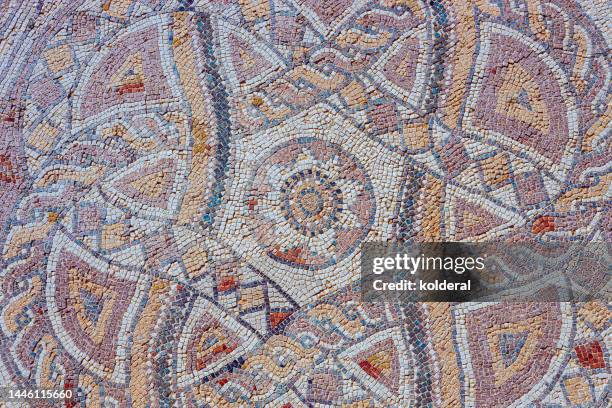 ancient roman mosaic full frame - mosaico foto e immagini stock