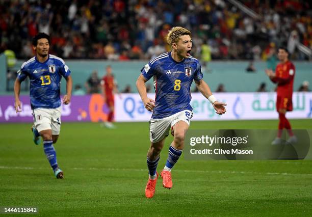 Ritsu Doan of Japan celebrates after scoring the team's first goal during the FIFA World Cup Qatar 2022 Group E match between Japan and Spain at...