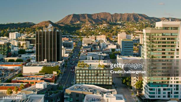aerial view of hollywood in los angeles, california with mt lee in the distance - hollywood hills los angeles bildbanksfoton och bilder