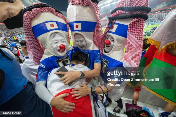 Japan fans celebrate their national team's victory after a FIFA World Cup Qatar 2022 Group E match between Spain and Japan at Khalifa International...