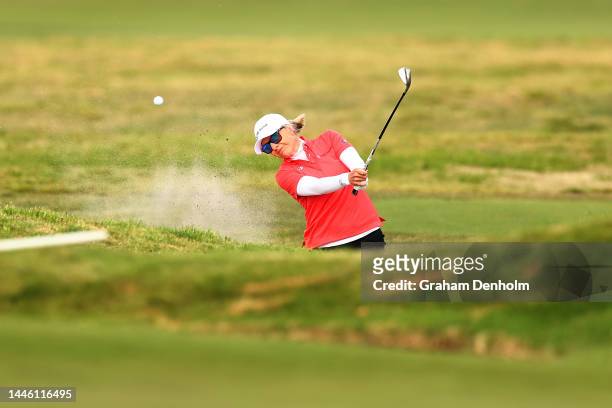 Sarah Kemp of Australia plays a shot from the bunker during Day 2 of the 2022 ISPS HANDA Australian Open at Kingston Heath on December 02, 2022 in...