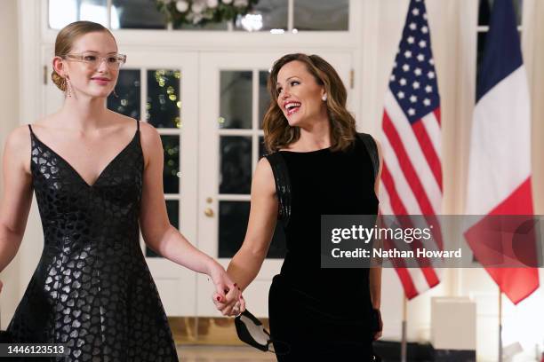 Actress Jennifer Garner and her daughter Violet arrive for the White House state dinner for French President Emmanuel Macron at the White House on...