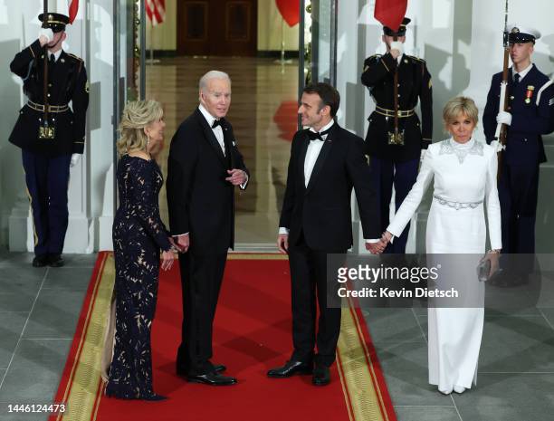 President Joe Biden and first lady Jill Biden welcome French President Emmanuel Macron and his wife Brigitte Macron to the North Portico of the White...