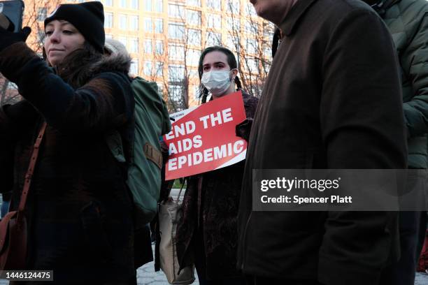 People gather at the AIDS Memorial on World AIDS Day on December 01, 2022 in New York City. Around the country, and world, people are coming together...