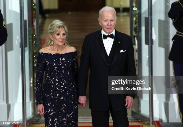 President Joe Biden and first lady Jill Biden wait for the arrival of French President Emmanuel Macron and his wife Brigitte Macron on the North...