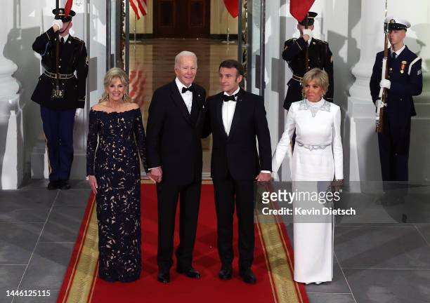 President Joe Biden and first lady Jill Biden welcome French President Emmanuel Macron and his wife Brigitte Macron to the North Portico of the White...