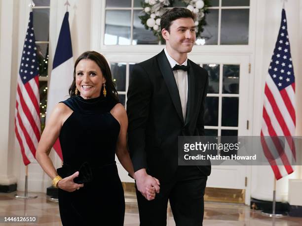 Actress Julia Louis-Dreyfus and her son Charlie Hall arrive for the White House state dinner for French President Emmanuel Macron at the White House...