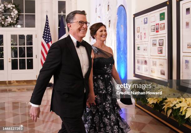 Comedian Stephen Colbert and his wife Evelyn McGee-Colbert arrive for the White House state dinner for French President Emmanuel Macron at the White...