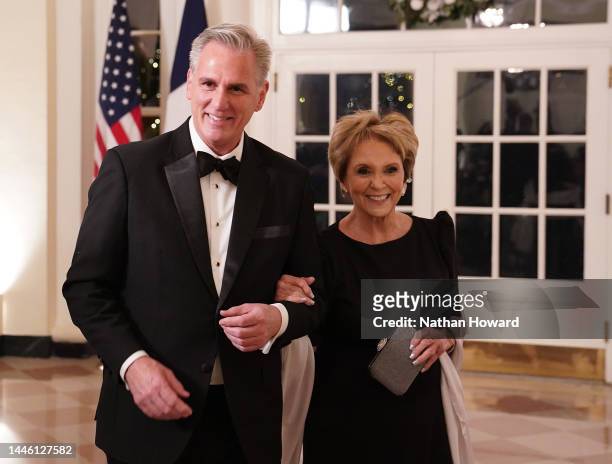 House Minority Leader Kevin McCarthy and his mother, Roberta McCarthy, arrive for the White House state dinner for French President Emmanuel Macron...