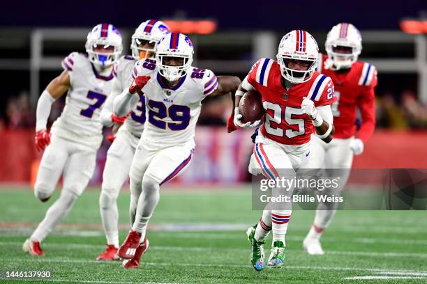 Marcus Jones of the New England Patriots runs for a first quarter touchdown against the Buffalo Bills in the first half at Gillette Stadium on...