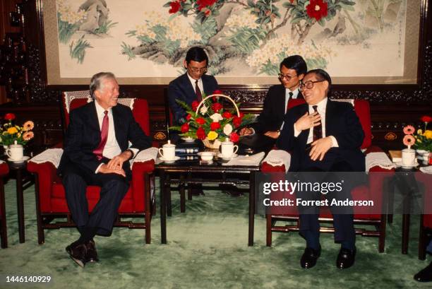 Former US President Jimmy Carter meets with Chinese Communist Party Secretary Jiang Zemin at Zhongnanhai Communist Party headquarters, Beijing,...