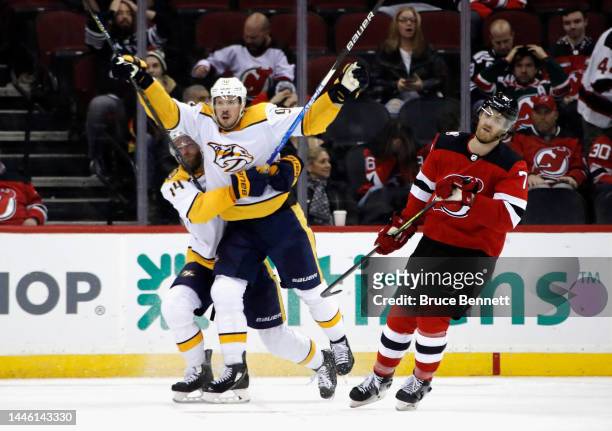 Ryan Johansen of the Nashville Predators scores at 33 seconds of overtime to defeat the New Jersey Devils 4-3 at the Prudential Center on December...
